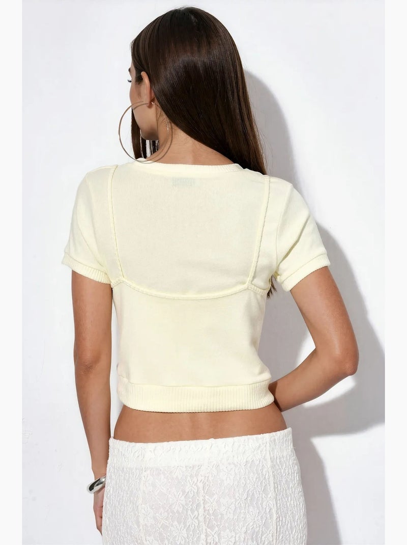 Top cropped canelado feminino busem Creme - Kiabi