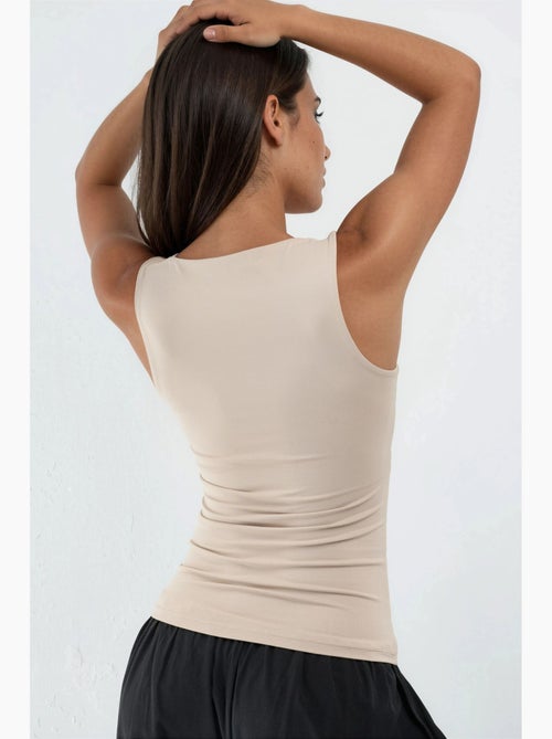 Top de alças tipo cami canelado e justo hiccup - Kiabi Top de alças tipo cami canelado e justo hiccup - Kiabi