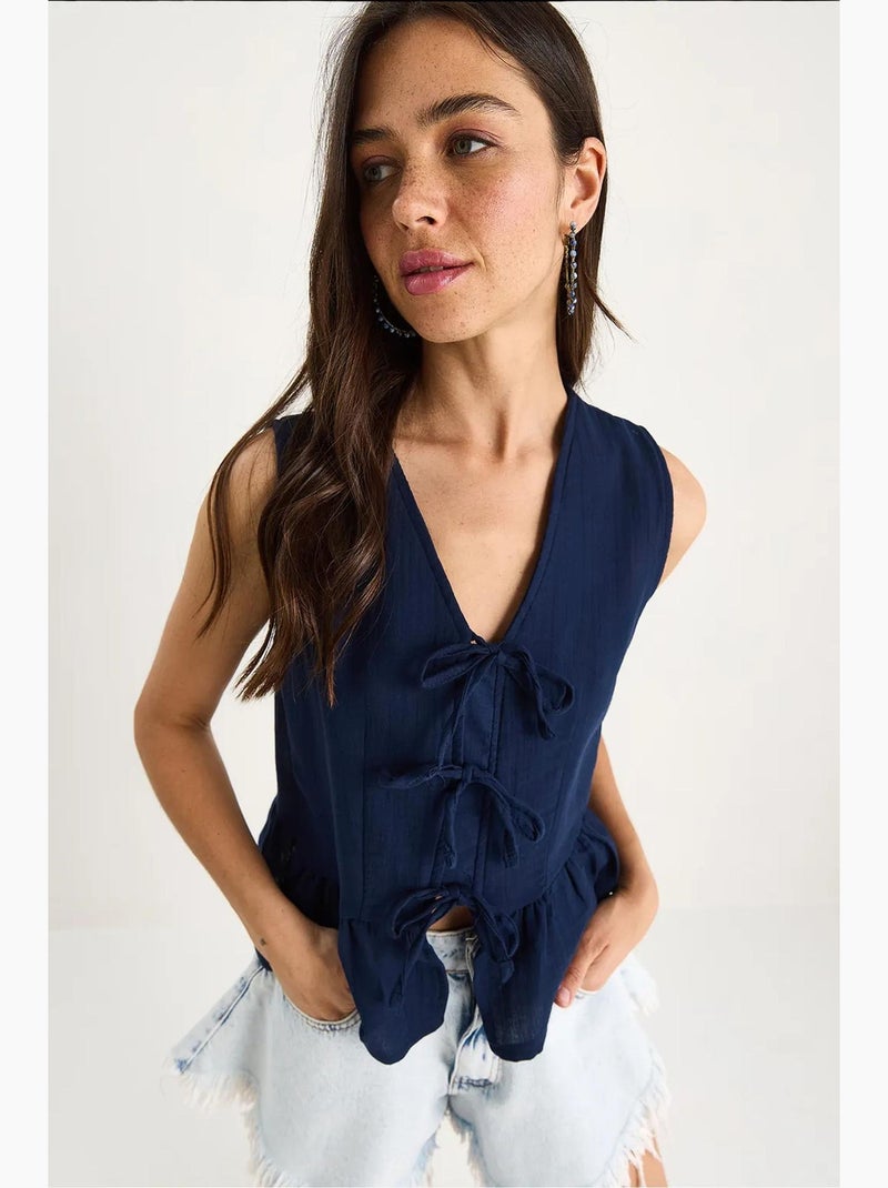 Top de crepe decote v com laço lucci Azul-marinho - Kiabi