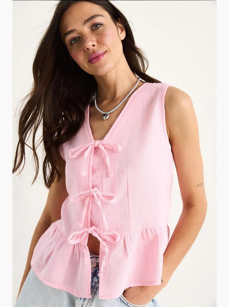 Top de crepe decote v com laço lucci Rosa-fluo/Solinotes - Kiabi