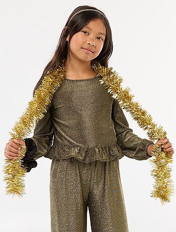 Top de malha brilhante com folhos