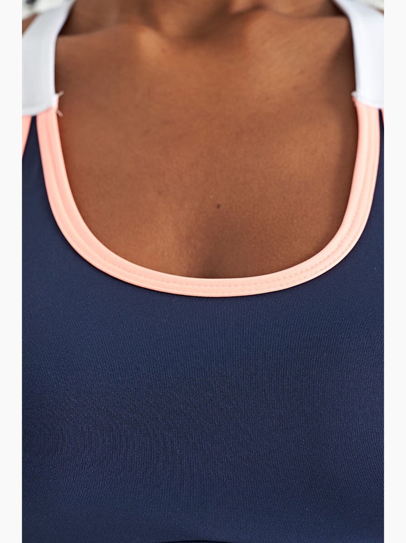 Top desportivo crop justo sem mangas tommy Azul Rosa Branco - Kiabi