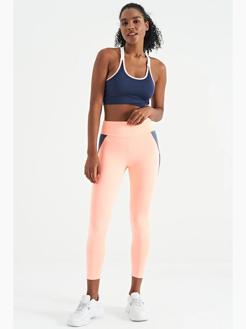 Top desportivo crop justo sem mangas tommy Azul Rosa Branco - Kiabi