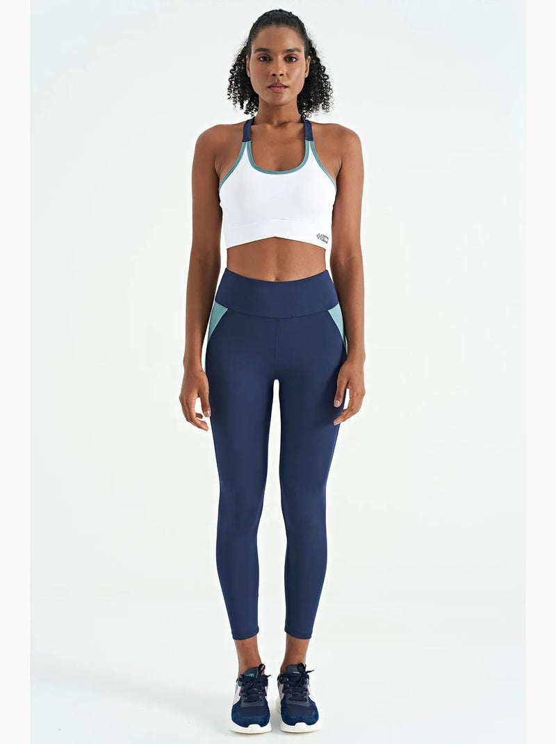 Top desportivo crop justo sem mangas tommy Branco Azul - Kiabi