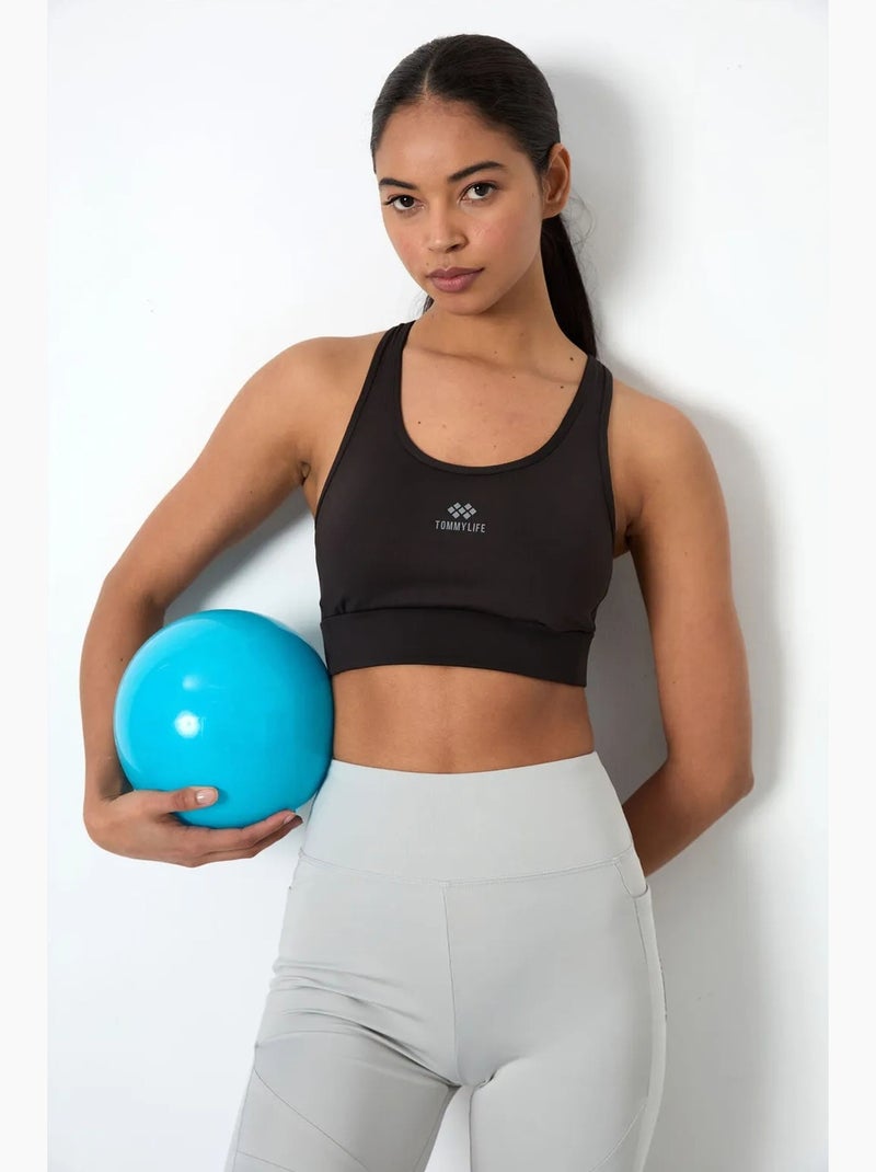 Top desportivo crop justo sem mangas tommy Preto - Kiabi
