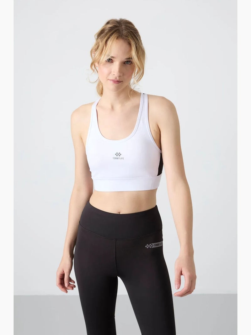 Top desportivo crop justo sem mangas tommy Preto - Kiabi