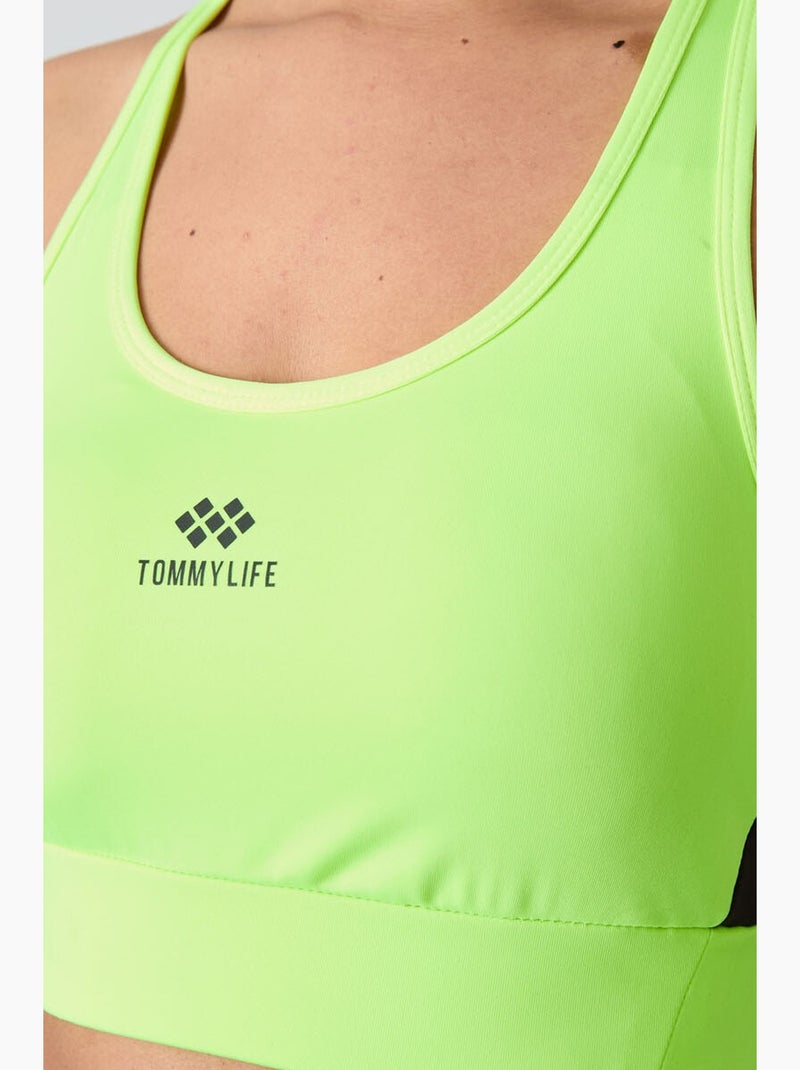 Top desportivo crop justo sem mangas tommy Verde tília - Kiabi