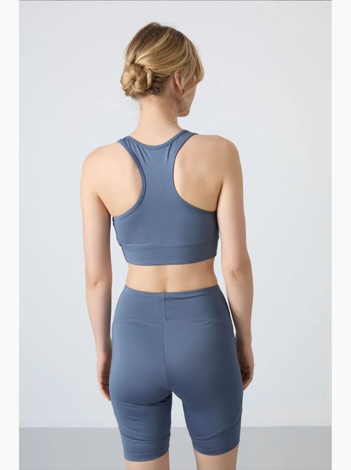 Top desportivo cropped justo sem mangas tommy - Kiabi Top desportivo cropped justo sem mangas tommy - Kiabi
