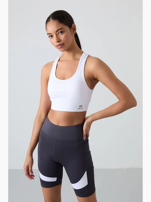 Top desportivo cropped justo sem mangas tommy - Kiabi Top desportivo cropped justo sem mangas tommy - Kiabi