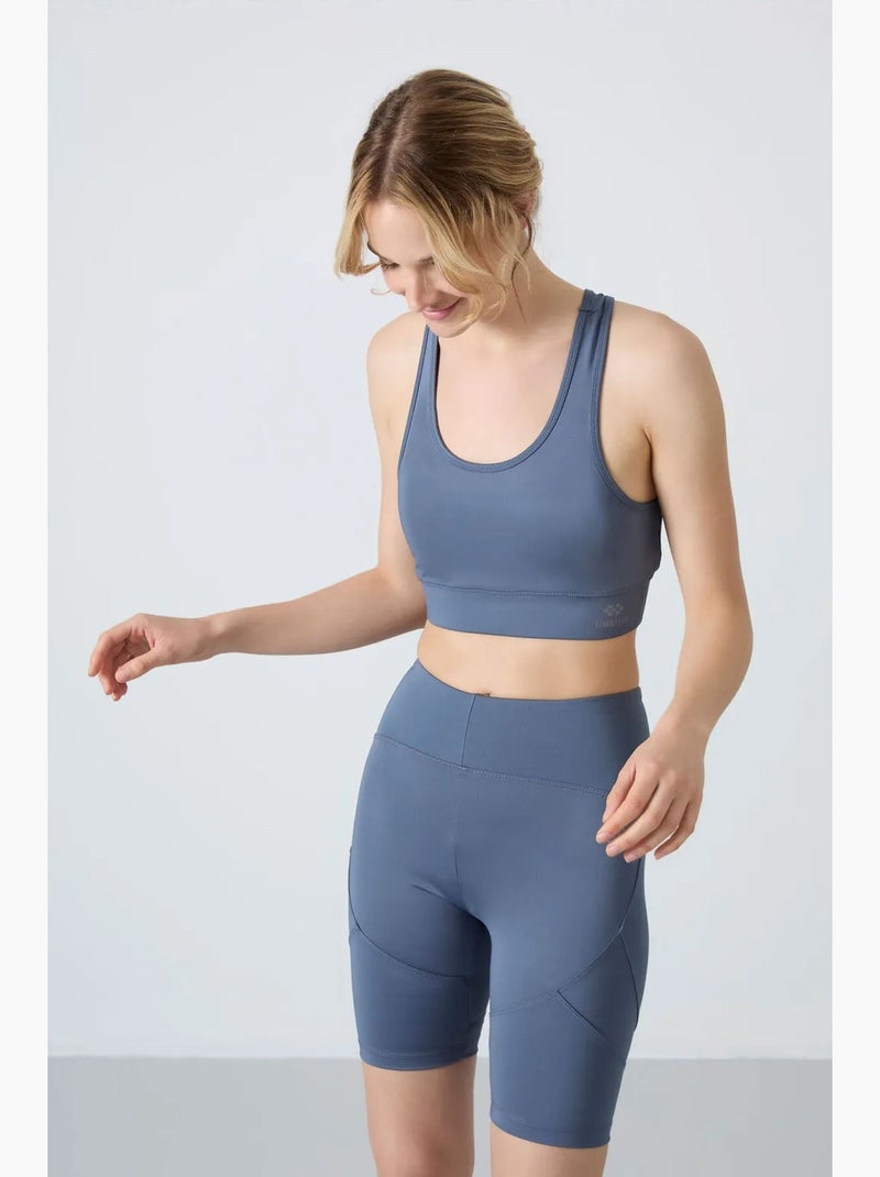 Top desportivo curto justo sem mangas tommy Azul - Kiabi