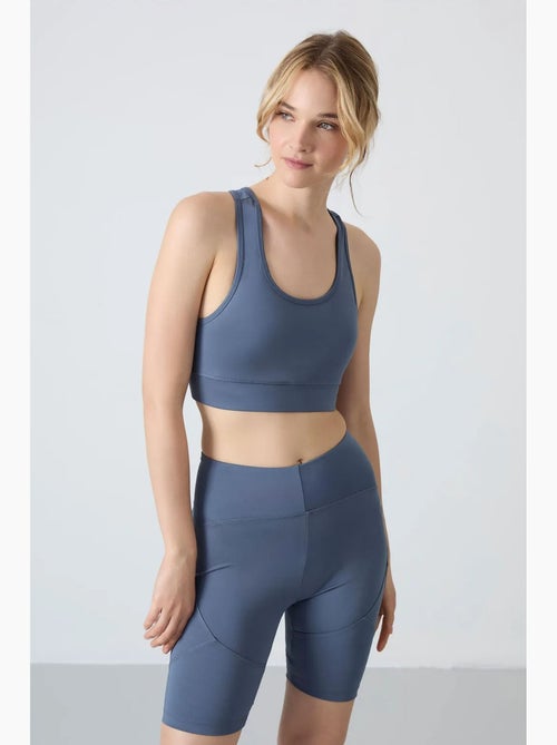 Top desportivo curto justo sem mangas tommy - Kiabi Top desportivo curto justo sem mangas tommy - Kiabi