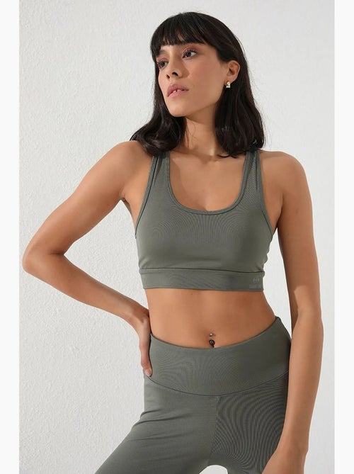 Top desportivo curto justo sem mangas tommy - Kiabi Top desportivo curto justo sem mangas tommy - Kiabi
