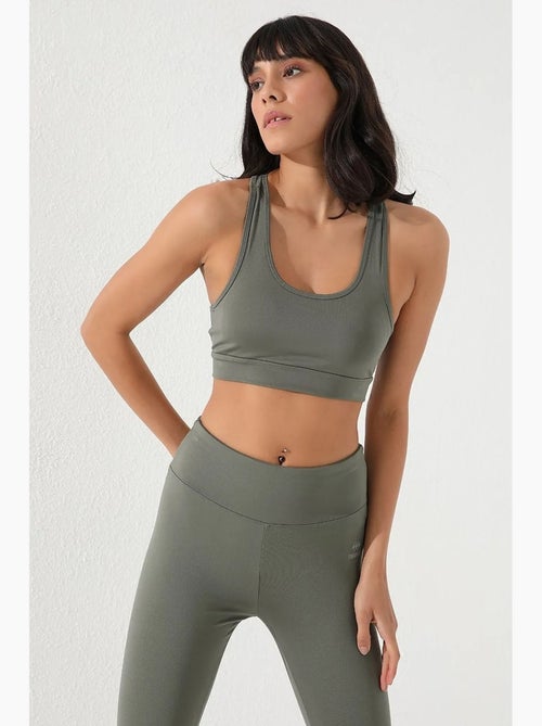 Top desportivo curto justo sem mangas tommy - Kiabi Top desportivo curto justo sem mangas tommy - Kiabi