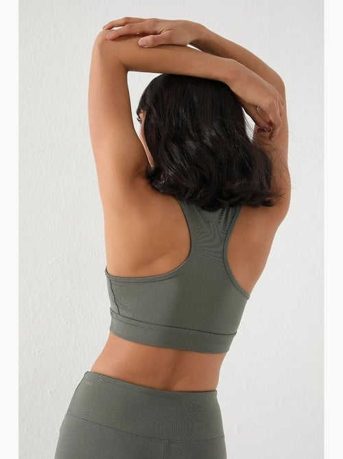 Top desportivo curto justo sem mangas tommy - Kiabi Top desportivo curto justo sem mangas tommy - Kiabi