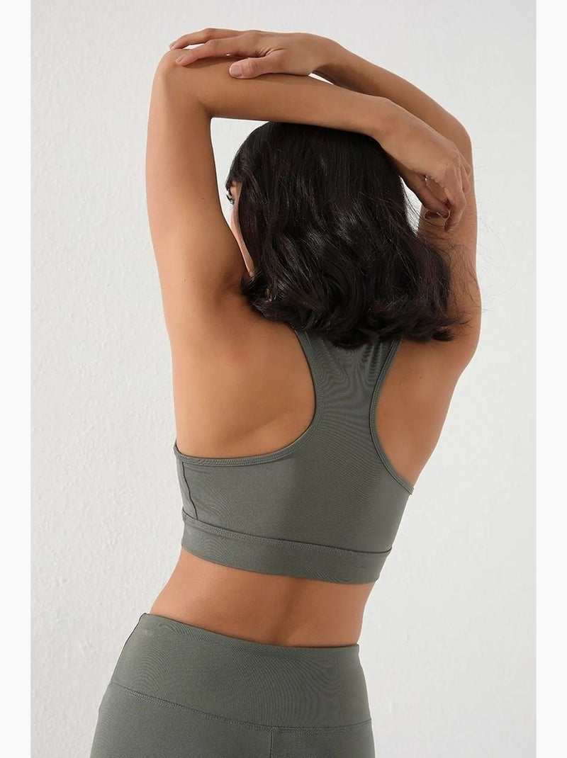 Top desportivo curto justo sem mangas tommy Cáqui - Kiabi