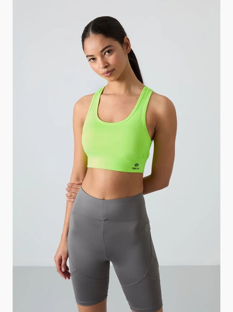Top desportivo curto justo sem mangas tommy Verde tília - Kiabi