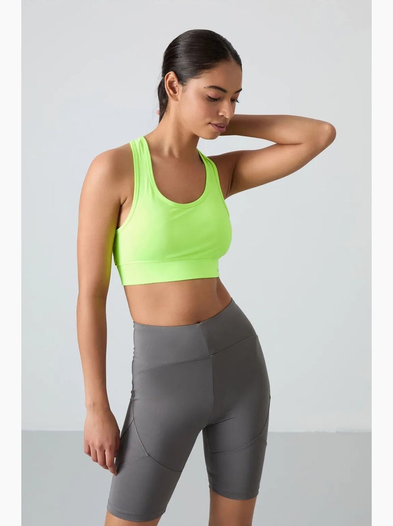 Top desportivo curto justo sem mangas tommy Verde tília - Kiabi