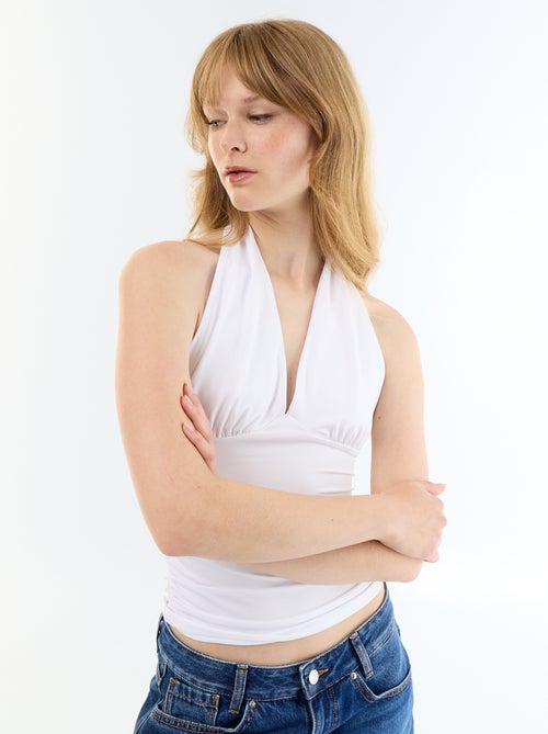 Top em tecido elástico com gola halter - Kiabi Top em tecido elástico com gola halter - Kiabi