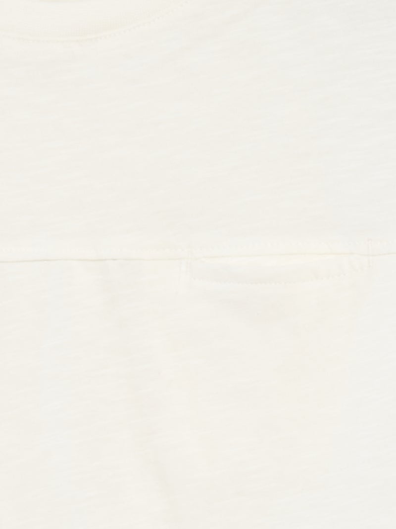 Top estilo largo com recorte frontal BEGE - Kiabi