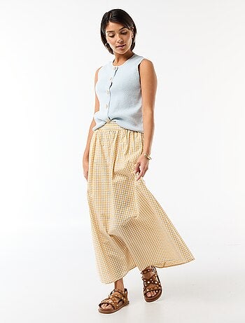 Top sem mangas com botões dourados