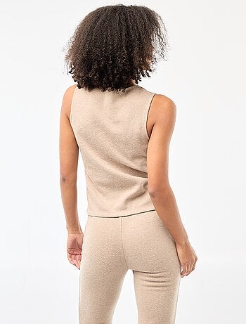 Top sem mangas com botões em malha macia