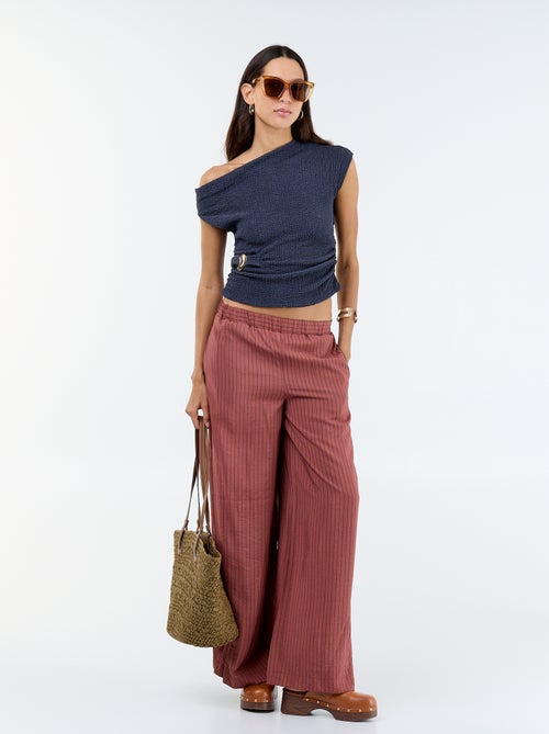 Top stretch liso assimétrico sem mangas - Kiabi