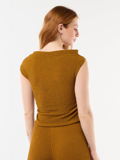 Top stretch liso assimétrico sem mangas - Kiabi