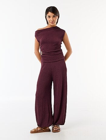 Top stretch liso assimétrico sem mangas