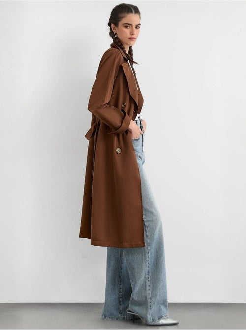 Trench coat comprido de trespasse duplo com cinto hiccup - Kiabi Trench coat comprido de trespasse duplo com cinto hiccup - Kiabi