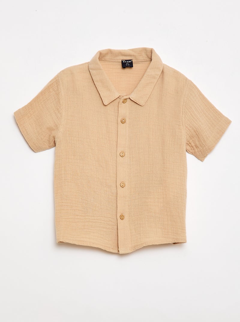 Um conjunto de duas peças camisa + calções Bege - Kiabi