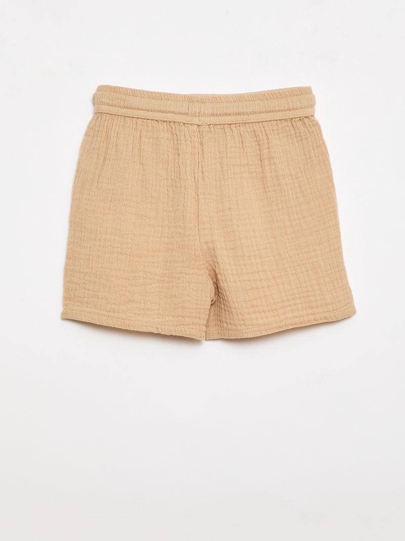 Um conjunto de duas peças camisa + calções Bege - Kiabi