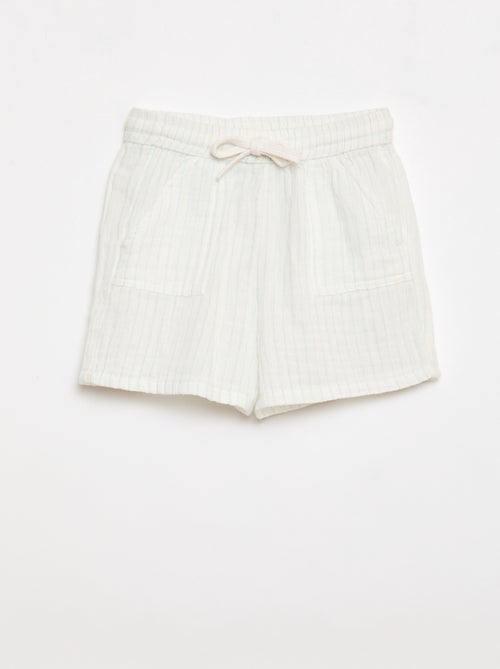 Um conjunto de duas peças camisa + calções - Kiabi