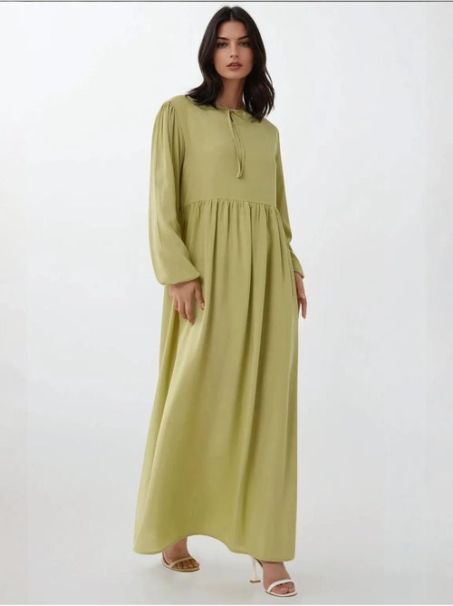 Vestido comprido com corte em a e gola redonda hiccup - Kiabi Vestido comprido com corte em a e gola redonda hiccup - Kiabi