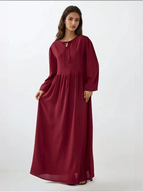 Vestido comprido com corte em a e gola redonda hiccup - Kiabi Vestido comprido com corte em a e gola redonda hiccup - Kiabi