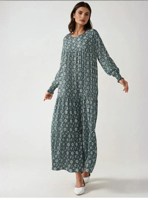 Vestido comprido em viscose com gola redonda estampado hiccup - Kiabi Vestido comprido em viscose com gola redonda estampado hiccup - Kiabi