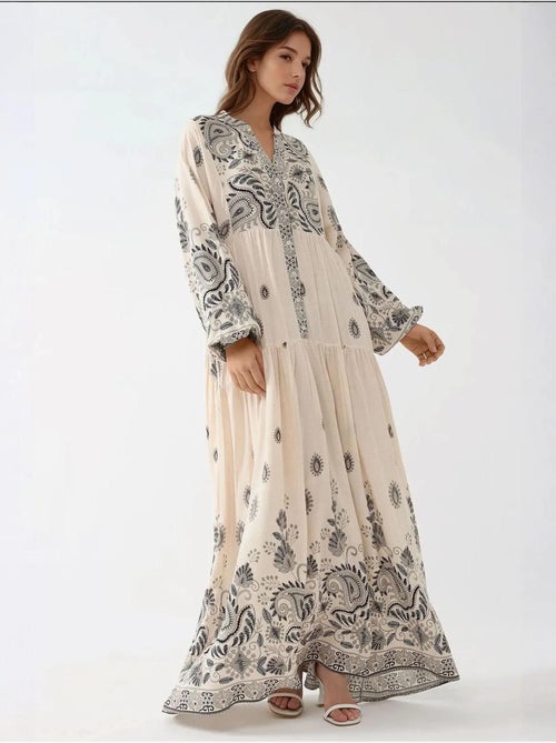 Vestido comprido estampado com decote em v e detalhe de botão hiccup - Kiabi Vestido comprido estampado com decote em v e detalhe de botão hiccup - Kiabi