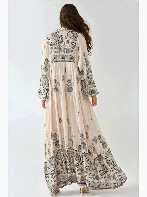Vestido comprido estampado com decote em v e detalhe de botão hiccup - Kiabi Vestido comprido estampado com decote em v e detalhe de botão hiccup - Kiabi