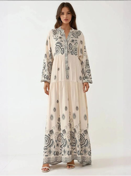 Vestido comprido estampado com decote em v e detalhe de botão hiccup - Kiabi Vestido comprido estampado com decote em v e detalhe de botão hiccup - Kiabi
