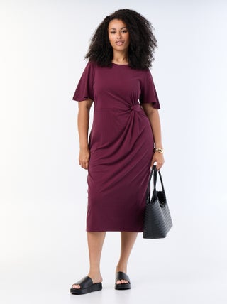 Vestido comprido liso com laço à frente