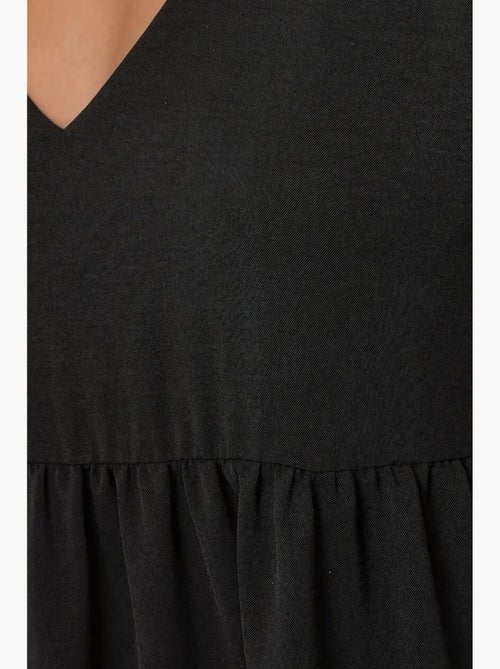 Vestido curto com decote em v e formato a hiccup - Kiabi Vestido curto com decote em v e formato a hiccup - Kiabi