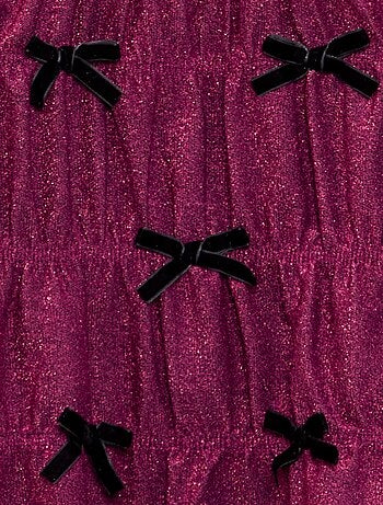 Vestido de malha brilhante com laços fantasia