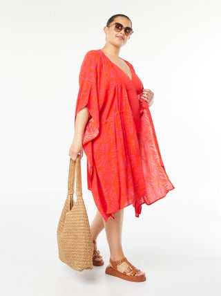 Vestido de praia aberto e estampado