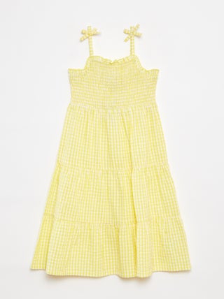 Vestido em tecido crepe com favos de mel na parte de cima