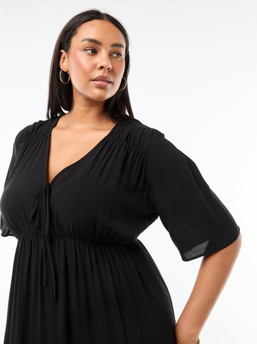 Vestido fluido com estampado fantasia - Kiabi