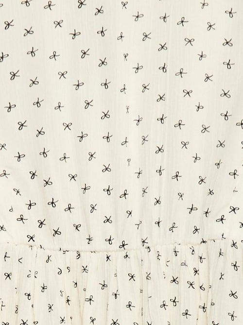 Vestido fluido com flores em malha crepe - Kiabi