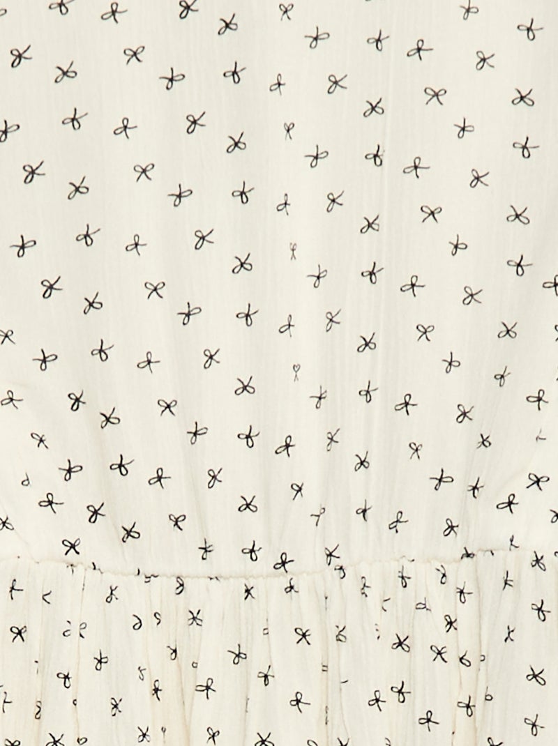 Vestido fluido com flores em malha crepe Bege - Kiabi