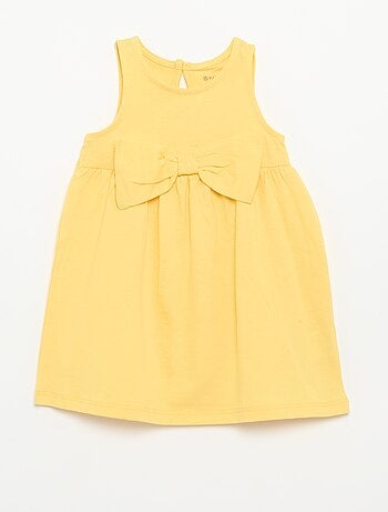 Vestido liso sem mangas com laço decorativo