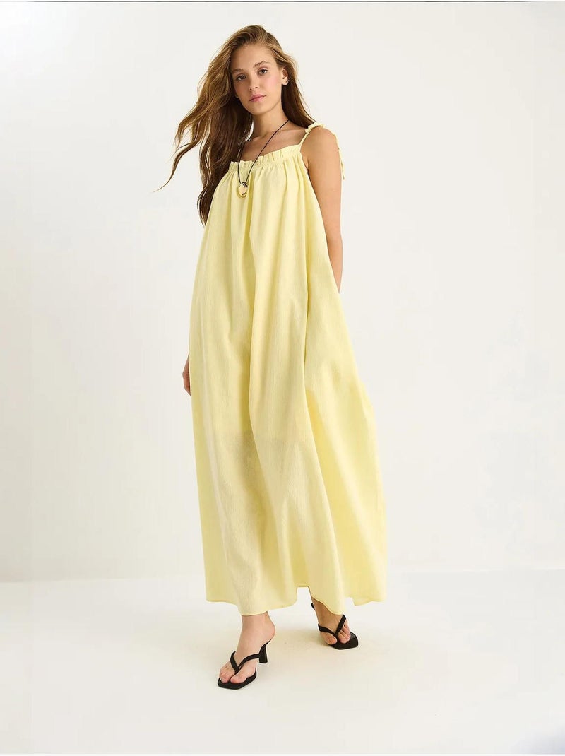 Vestido maxi com detalhe de folho lucci Amarelo-limão - Kiabi
