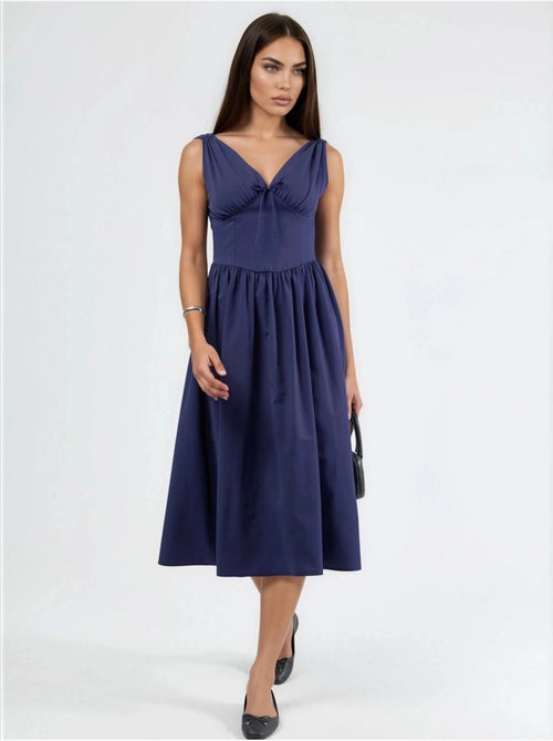 Vestido midi com decote em v e detalhe de laço busem - Kiabi Vestido midi com decote em v e detalhe de laço busem - Kiabi