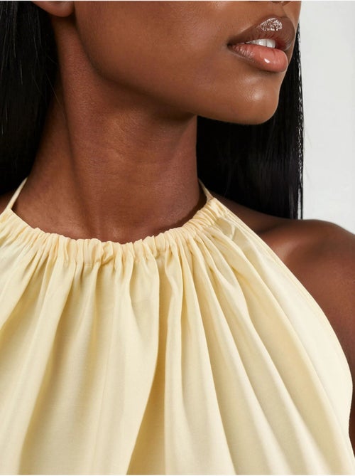Vestido midi com decote halter busem - Kiabi Vestido midi com decote halter busem - Kiabi